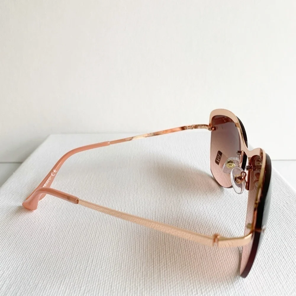 NWT pink and rose gold semi rimless sunglasses
